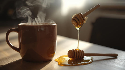 Honey sticks dripping golden honey into steaming tea cup showing popular way of how to eat honey sticks in hot beverages